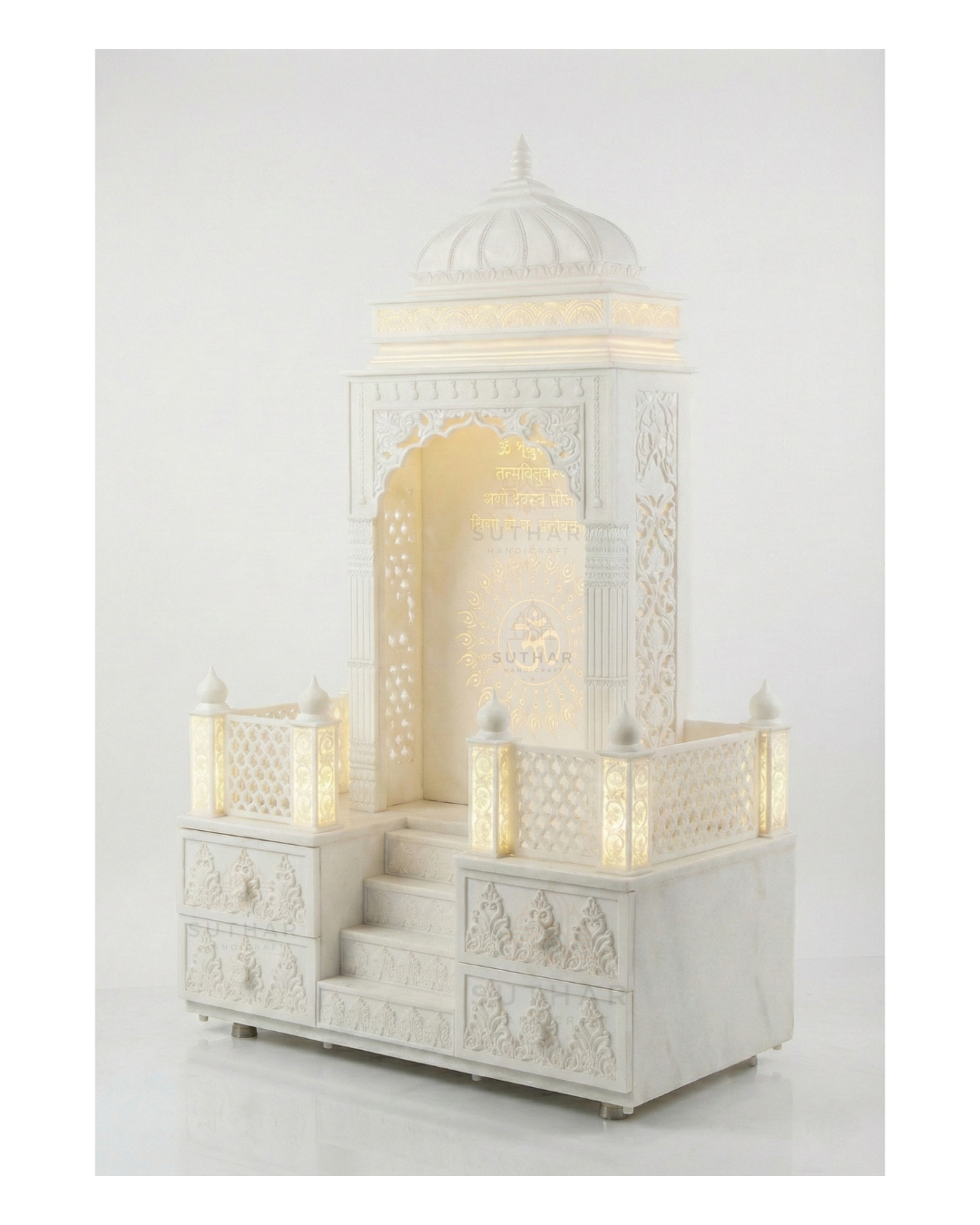White Corian traditional mandir with dome and carved drawers